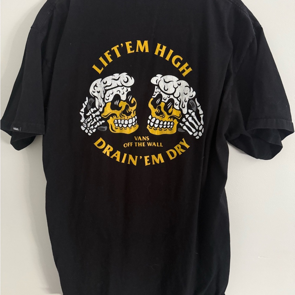 Vans Black Short-Sleeve Graphic Tee with Yellow & White Skull Design